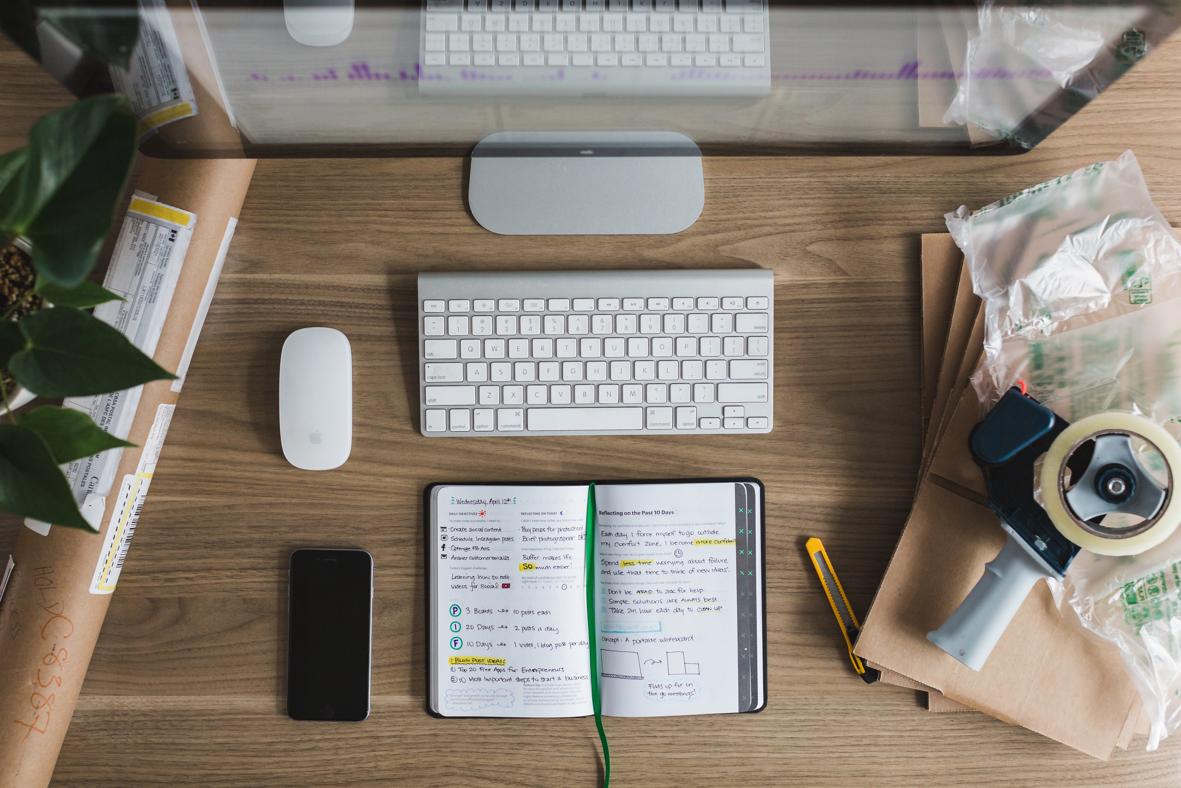 Overhead view of a desk with a notebook