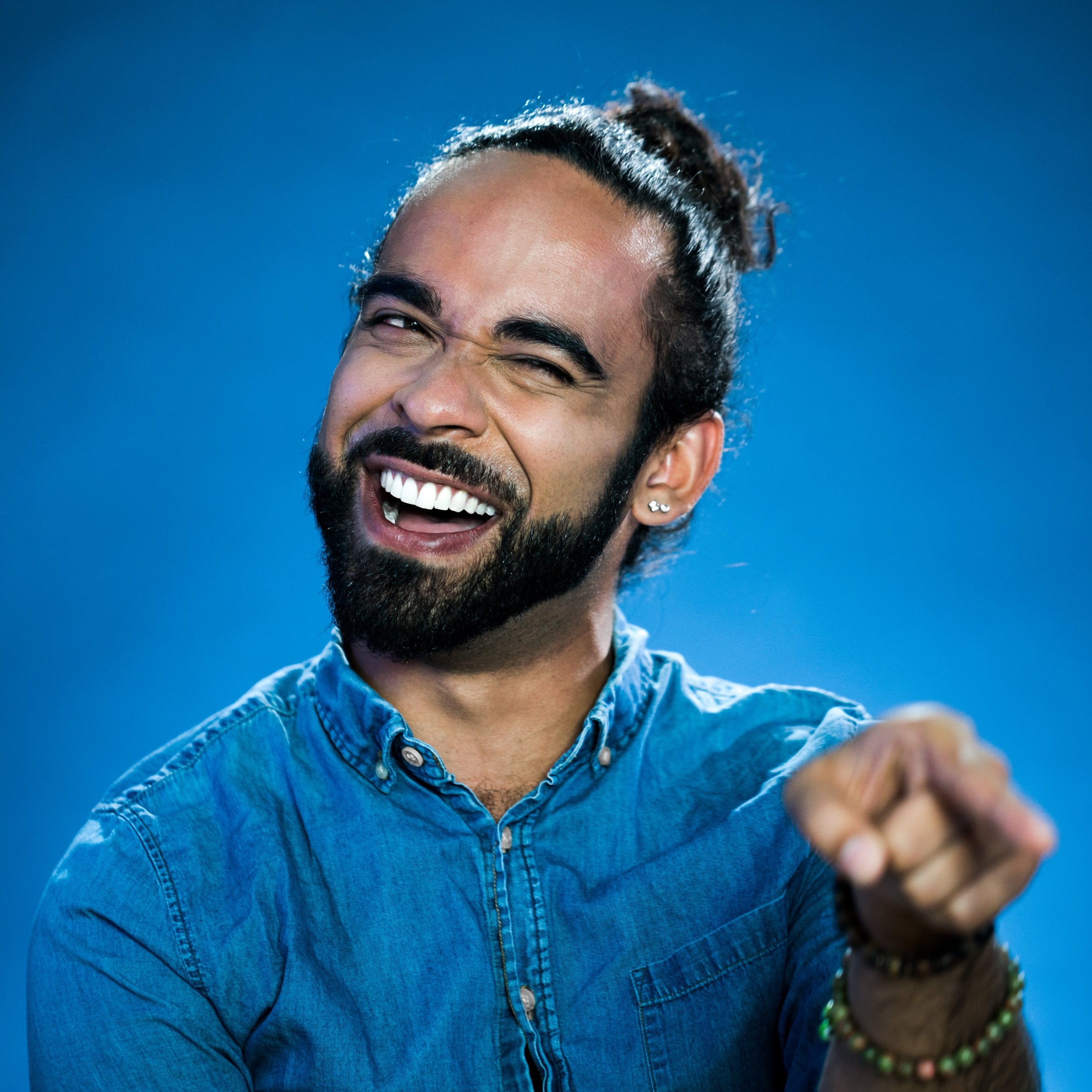 Happy young man smiling